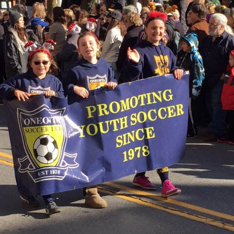 OSC players take part in a parade